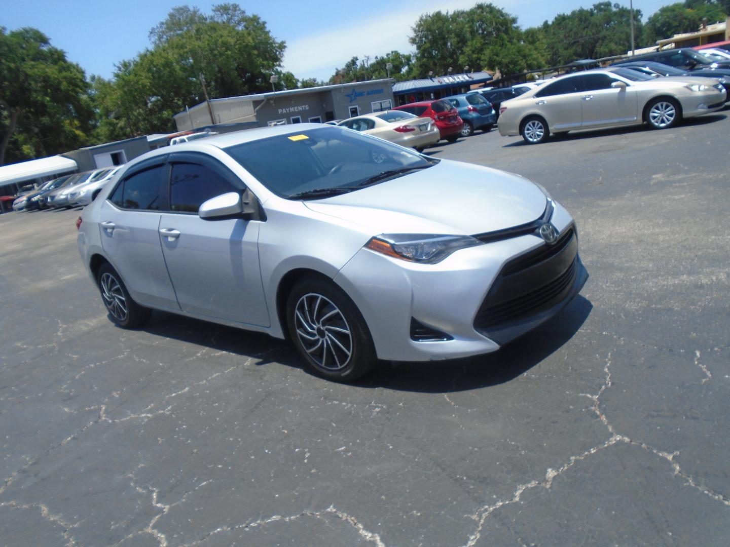 2017 SILVER Toyota Corolla L CVT (2T1BURHE1HC) with an 1.8L L4 DOHC 16V engine, CVT transmission, located at 6112 N Florida Avenue, Tampa, FL, 33604, (888) 521-5131, 27.954929, -82.459534 - Photo#3